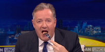 Piers Morgan eats steak in front of vegan protestor to try and make a point