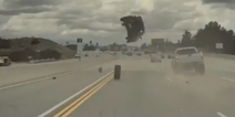 Shocking moment car launched into the air after being hit by stray tyre caught on dashcam