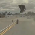Shocking moment car launched into the air after being hit by stray tyre caught on dashcam