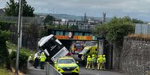 Bus Éireann to launch probe after one of its double-deckers crashes into railway bridge