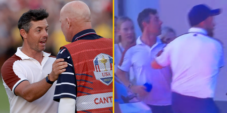Shane Lowry holds Rory McIlroy back during Ryder Cup car park row