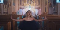 Catholic priest stripped of duties after allowing pop star to film provocative music video in church