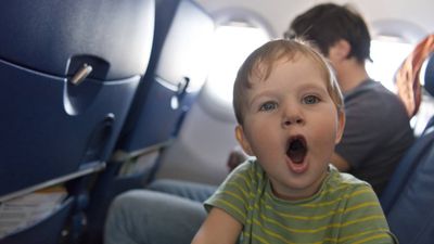 Parents blasted for letting their toddler ‘run wild’ on long-haul flight