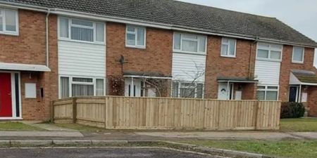 Woman leaves neighbours fuming after building 100ft fence around garden